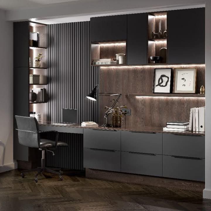 Compact fitted home office with dark cabinetry and open shelving