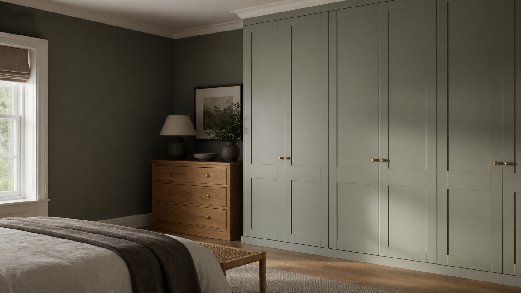 Spray-finished painted Shaker wardrobe doors in a refined bedroom